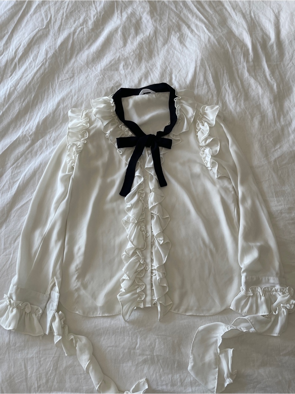 White ruffle bow blouse
